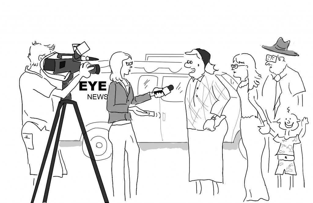 A TV interviewer interviewing Chasidic people