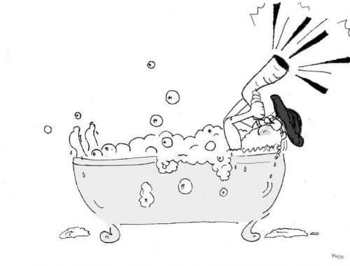 A man blowing a shofar in the bathtub